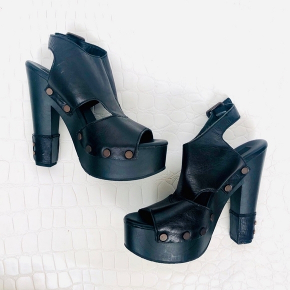 Calvin Klein Shoes - Calvin Klein “Terra” Leather Peep Toe Platforms